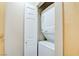 Convenient laundry area with a stacked washer and dryer for space-saving efficiency at 55 E Agate Ave # 309, Las Vegas, NV 89123