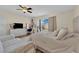 Bedroom with hardwood floors, ceiling fan, and natural light at 5530 Berchmans Ave, Las Vegas, NV 89122