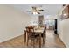 Bright dining area with wood floors adjacent to the kitchen, great for easy meal service and everyday living at 5530 Berchmans Ave, Las Vegas, NV 89122