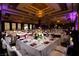 Elegantly decorated banquet hall with tables set for a formal event and atmospheric lighting at 557 Overlook Rim Dr, Henderson, NV 89012