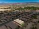 Nice aerial view of home with gorgeous mountain views in the Mountain Falls community at 5635 E La Campana Dr, Pahrump, NV 89061
