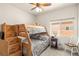 Cozy bedroom featuring a wooden bunk bed, carpet flooring, and a window at 5635 E La Campana Dr, Pahrump, NV 89061
