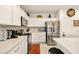 Well-equipped kitchen featuring stainless steel appliances and ample counter space at 5635 E La Campana Dr, Pahrump, NV 89061