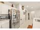 Modern kitchen showcasing stainless steel refrigerator and stylish backsplash at 5635 E La Campana Dr, Pahrump, NV 89061