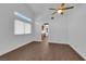 The open-concept living room features tile floors, lots of natural light, and neutral colored walls at 6150 W Brooks Ave, Las Vegas, NV 89108