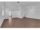 The open-concept living room features tile floors, lots of natural light, and neutral colored walls at 6150 W Brooks Ave, Las Vegas, NV 89108