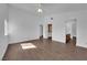 Main bedroom boasts wood-look floors, high ceilings, ensuite bath and walk-in closet at 6150 W Brooks Ave, Las Vegas, NV 89108