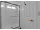 Glass-enclosed tiled shower with updated fixtures and bright natural light at 6150 W Brooks Ave, Las Vegas, NV 89108