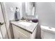Contemporary bathroom featuring modern fixtures, a granite countertop, and a clean, well-lit space at 6232 Bristol Way, Las Vegas, NV 89107