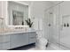 Sleek bathroom with a glass shower, modern vanity, and clean white tile at 667 Palisade Rim Dr, Henderson, NV 89012