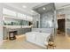 Modern bathroom with a sleek soaking tub, glass shower, and double vanities at 667 Palisade Rim Dr, Henderson, NV 89012