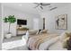 Relaxing bedroom featuring a seating area, stylish decor, and a view of the outdoors at 667 Palisade Rim Dr, Henderson, NV 89012