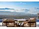 Daytime view of the city skyline from the home's outdoor seating area at 667 Palisade Rim Dr, Henderson, NV 89012