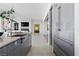Bright, modern kitchen featuring a large island, sleek cabinets and stainless appliances at 667 Palisade Rim Dr, Henderson, NV 89012