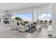 Bright living room with comfortable seating, modern decor, and breathtaking panoramic views at 667 Palisade Rim Dr, Henderson, NV 89012