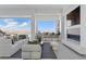 Elegant living space with a stylish fireplace, contemporary design, and stunning outdoor views at 667 Palisade Rim Dr, Henderson, NV 89012