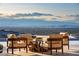 Comfortable outdoor seating area showcasing panoramic views of the city and mountains at 667 Palisade Rim Dr, Henderson, NV 89012