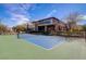 Enjoy a match on the community tennis court with a beautiful clubhouse in the background at 667 Palisade Rim Dr, Henderson, NV 89012
