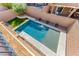 Aerial view of the pool showcasing the clean lines and surrounding patio and landscaping at 689 Silver Pearl St, Henderson, NV 89002