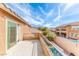 Outdoor balcony area overlooking a swimming pool and landscaped backyard at 689 Silver Pearl St, Henderson, NV 89002