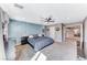 Bedroom with modern furniture, neutral walls and a ceiling fan at 689 Silver Pearl St, Henderson, NV 89002