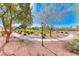 Picturesque green space with well-maintained walkways, offering a tranquil environment for residents to enjoy nature at 689 Silver Pearl St, Henderson, NV 89002