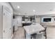 Spacious kitchen with a large island, stainless appliances, and seamless design at 689 Silver Pearl St, Henderson, NV 89002