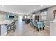 Bright open-concept living area seamlessly connects kitchen, dining, and living spaces at 689 Silver Pearl St, Henderson, NV 89002