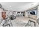 Spacious living room features an open floor plan with the kitchen and dining areas at 689 Silver Pearl St, Henderson, NV 89002