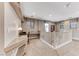 Upstairs loft area features built-in desks, plush carpeting, and neutral walls at 689 Silver Pearl St, Henderson, NV 89002