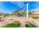 Colorful playground with shade canopy, providing a safe and enjoyable play area for children in the community at 689 Silver Pearl St, Henderson, NV 89002