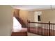 Foyer with hardwood steps and banister leading to the second floor at 7073 Seabirds Pl, North Las Vegas, NV 89084