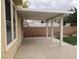 Covered patio perfect for outdoor relaxation overlooking the backyard at 7073 Seabirds Pl, North Las Vegas, NV 89084