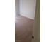 This is a bedroom that features neutral colored carpet and walls at 7342 Tanglewood Park St, Las Vegas, NV 89166