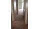 Hallway featuring carpet flooring and view into another room at 7342 Tanglewood Park St, Las Vegas, NV 89166