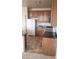 Kitchen featuring light-colored cabinets and appliances at 7342 Tanglewood Park St, Las Vegas, NV 89166