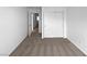 Inviting bedroom featuring neutral carpeting and paint with plenty of closet space at 7452 Sunray Point St, North Las Vegas, NV 89084