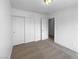 Inviting bedroom with a large closet and neutral carpeting and paint creates a relaxing retreat at 7452 Sunray Point St, North Las Vegas, NV 89084