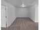 Spacious bonus room with plush carpeting, neutral paint, and recessed lighting offers flexibility at 7452 Sunray Point St, North Las Vegas, NV 89084