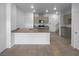 Kitchen featuring gray cabinets and stainless steel appliances at 7452 Sunray Point St, North Las Vegas, NV 89084