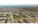 Aerial view of the neighborhood with community center featuring green spaces and community pool at 746 Purple Knoll Walk, Henderson, NV 89011