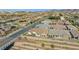 High-angle view of single-Gathering homes with tile roofs and desert landscaping in a planned community at 746 Purple Knoll Walk, Henderson, NV 89011