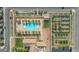 Overhead shot of community pool, tennis courts, clubhouse and well-maintained landscaping at 746 Purple Knoll Walk, Henderson, NV 89011