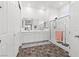 Bathroom showcasing double sinks, glass shower, and tile flooring at 746 Purple Knoll Walk, Henderson, NV 89011