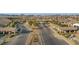 Entrance to a Lennar Heritage community, showing landscaped boulevards and covered seating areas at 746 Purple Knoll Walk, Henderson, NV 89011