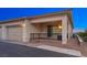 Charming home with a neutral-toned exterior, a one car garage and a cozy gated porch at 746 Purple Knoll Walk, Henderson, NV 89011
