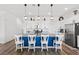 Bright, modern kitchen with stylish island and stainless steel appliances at 746 Purple Knoll Walk, Henderson, NV 89011
