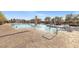 Community pool with ample lounge areas and covered cabanas, set amongst desert landscaping at 746 Purple Knoll Walk, Henderson, NV 89011