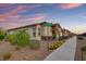 Street view of a single-story home with desert landscaping at 746 Purple Knoll Walk, Henderson, NV 89011