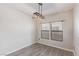 Bright dining area with updated floors and a modern light fixture, showcasing a cozy space at 8250 N Grand Canyon Dr # 1084, Las Vegas, NV 89166